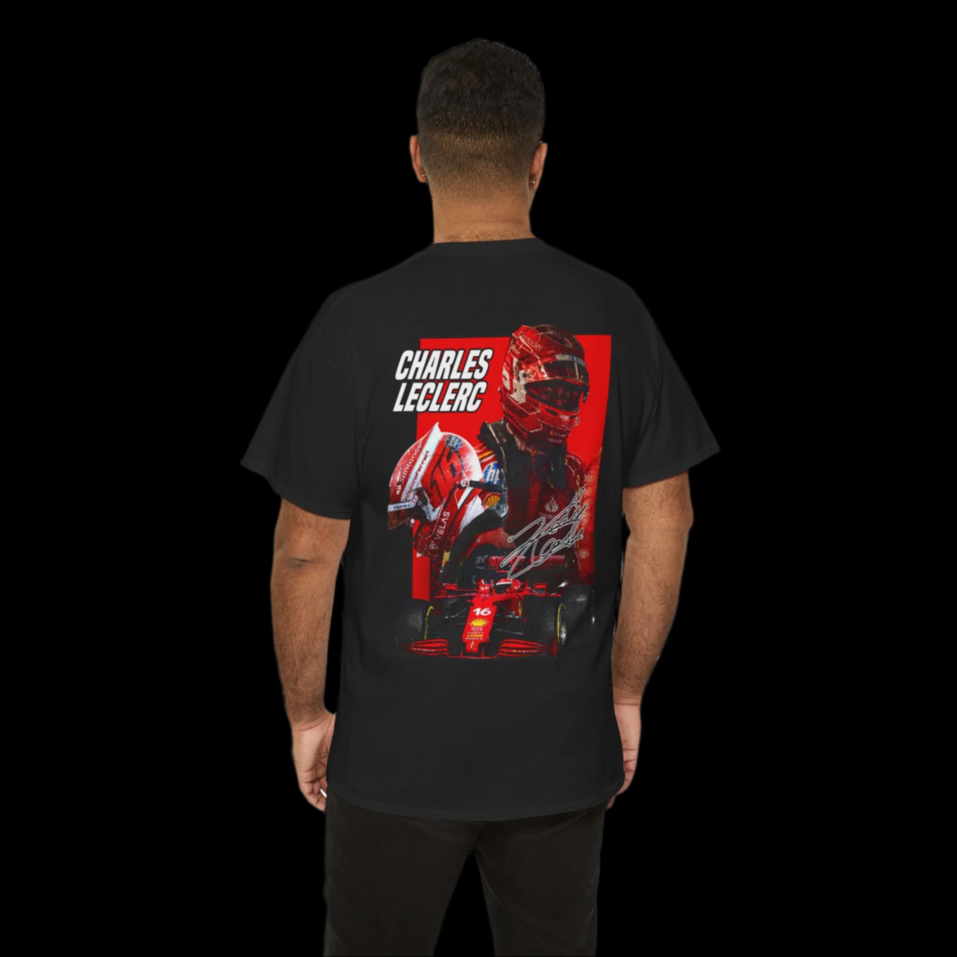 Person wearing a black t-shirt with a graphic design on the back, featuring a charles leclerc in a helmet and text.
